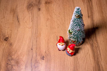 Christmas background with Christmas tree and figures.