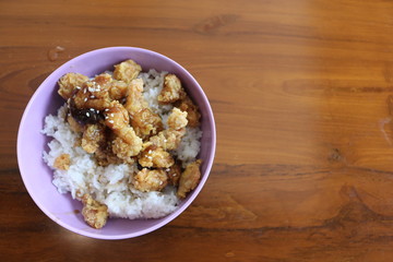a bowl of delicious rice on the table.