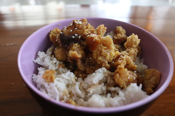 a bowl of delicious rice on the table.