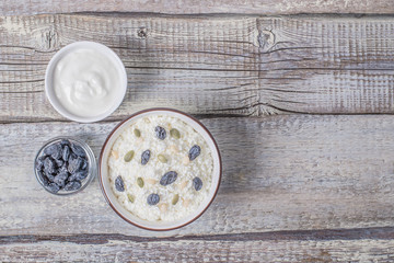 Сurd on a plate with raisin, honey, pumpkin seed. Healthy breakfast Cottage cheese