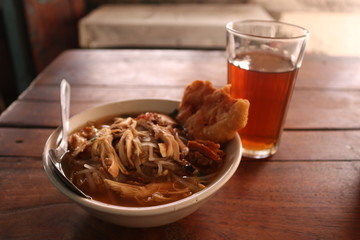 Soto is a traditional Indonesian soup mainly composed of broth, meat, and vegetables. Many traditional soups are called soto, whereas foreign and Western influenced soups are called sop.