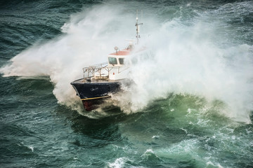 incredible view of a pilot boat in the storm