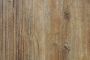 Obraz premium Closeup of wooden wall with texture and rough surface in warm brown tone for background and decoration.