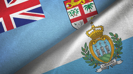 Fiji and San Marino two flags textile cloth, fabric texture
