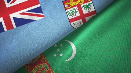 Fiji and Turkmenistan two flags textile cloth, fabric texture