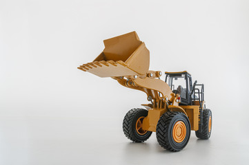 Wheel loader model on white background  with bucket lift up