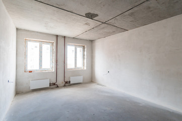 Russia, Omsk- August 05, 2019: interior room apartment. rough repair for self-finishing. interior decoration, bare walls of the room, stage of construction