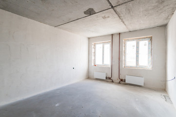 Russia, Omsk- August 05, 2019: interior room apartment. rough repair for self-finishing. interior decoration, bare walls of the room, stage of construction