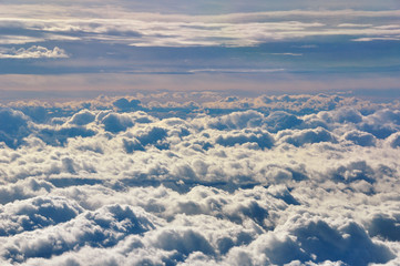 Fototapeta na wymiar A sea of stratocumulus clouds, shot taken from the flight deck of an airliner in cruise