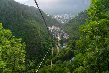 BORJOMI, GEORGIA - JUNE 27, 2019: One of the favorite tourist attractions in resort is the cable car ride over the Mineral Water Park and Borjomi