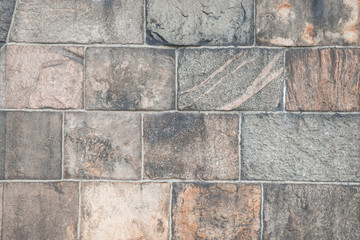 Texture of a stone wall. Old castle stone wall. Stone wall as a background or texture. Rock texture