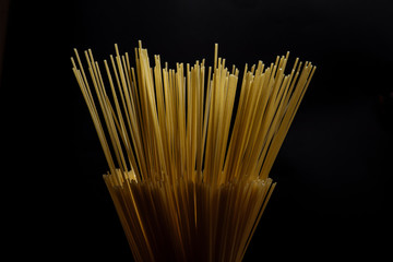 bunch of spaghetti isolated onblack background