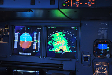 Close up shot on the weather radar on the Navigation Display screen of an Airbus, visible returns