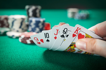Man plays poker in the casino