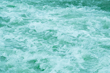 rough ocean waves, stormy sea surf, fast flowing mountain river