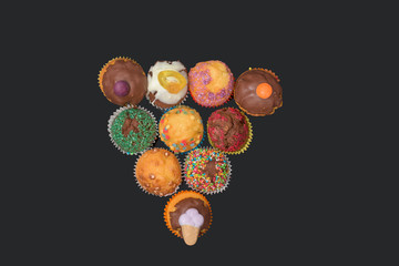 muffins on a dark background, top view
