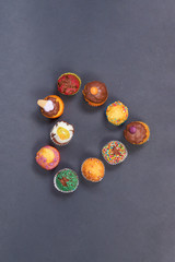 heart shaped muffins on a dark background, top view