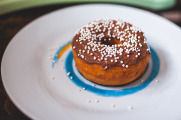 Obraz na płótnie Canvas delicious donuts on the table
