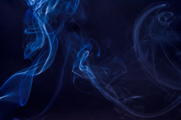 Colourful smoke fumes in different patterns on a black isolated background. Print for t-shirt.