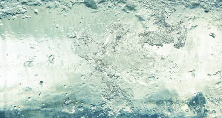 Ice background. The frozen texture of the water
