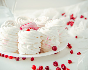 Handmade air russian fruit white marshmallow on a white background. Homemade Sweets.