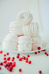 Handmade air russian fruit white marshmallow on a white background. Homemade Sweets.
