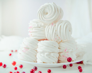 Handmade air russian fruit white marshmallow on a white background. Homemade Sweets.