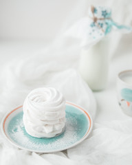 Handmade air russian fruit white marshmallow on a white background. Homemade Sweets.