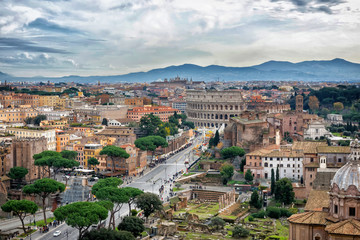 Fototapeta na wymiar Panorama of the ancient part of Rome - the Colosseum, the forum, from the height of Vittoriano