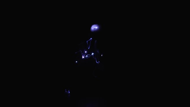 Doc in LED costume on stage