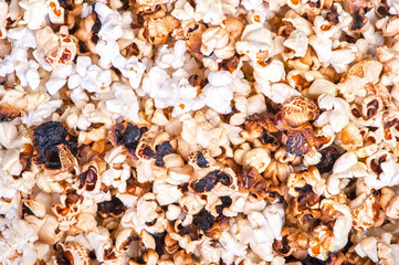 Background of burnt dark popcorn