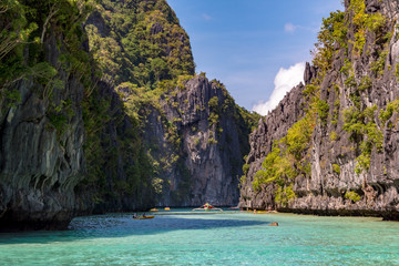 Naklejka na ściany i meble Big lagoon surrounded by rocks, El Nido Palawan Philippines