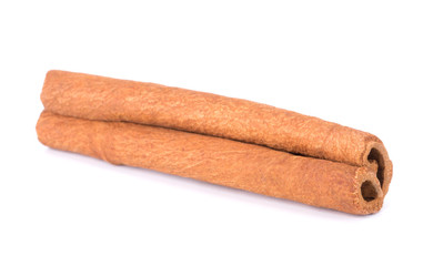 Cinnamon Sticks Stacked isolated on White background closeup macro shot