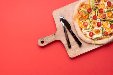 Pizza vegetarian on wooden board. Homemade pizza primavera