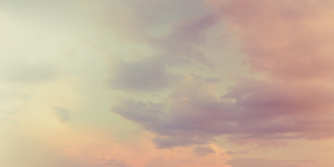 Sunset sky with pastel clouds background.