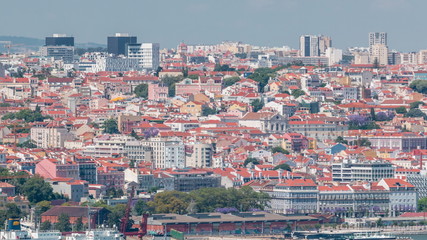 Obraz premium Panorama of Lisbon historical centre aerial timelapse viewed from above the southern margin of the Tagus or Tejo River.