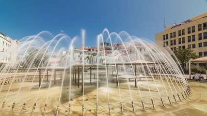 Fountain in Martim Moniz square timelapse hyperlapse in downtown Lisbon