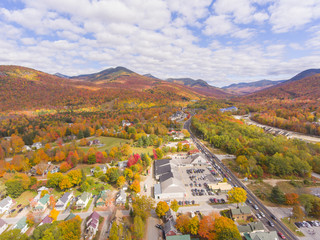 Lincoln Main Street at town center and Little Coolidge Mountain on Kancamagus Highway aerial view with fall foliage, Town of Lincoln, New Hampshire NH, USA.