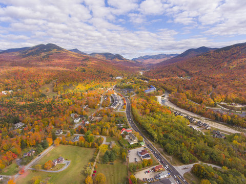 Lincoln Main Street at town center and Little Coolidge Mountain on Kancamagus Highway aerial view with fall foliage, Town of Lincoln, New Hampshire NH, USA.
