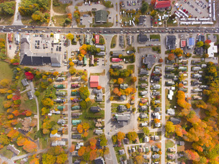 Lincoln Main Street at town center on Kancamagus Highway top view with fall foliage, Town of Lincoln, New Hampshire NH, USA.