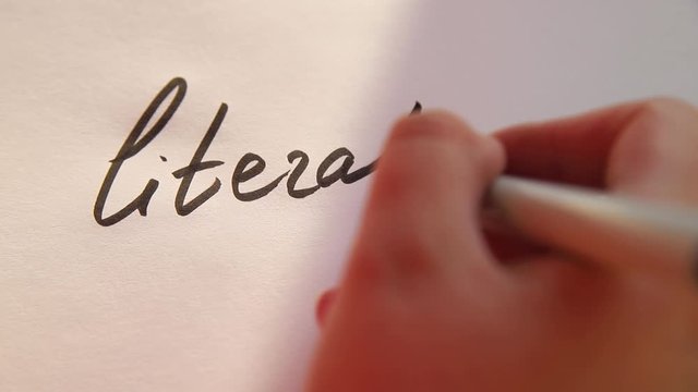 Hand writing Literature on white paper