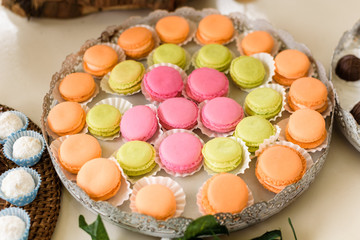 Colorful macaroons served on a candy table