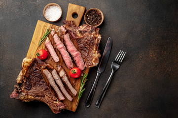 two grilled steaks with spices, with two types of frying with copy space for your text