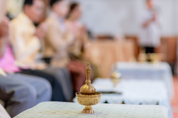 buddhist pouring water contains.image for background and copy space.