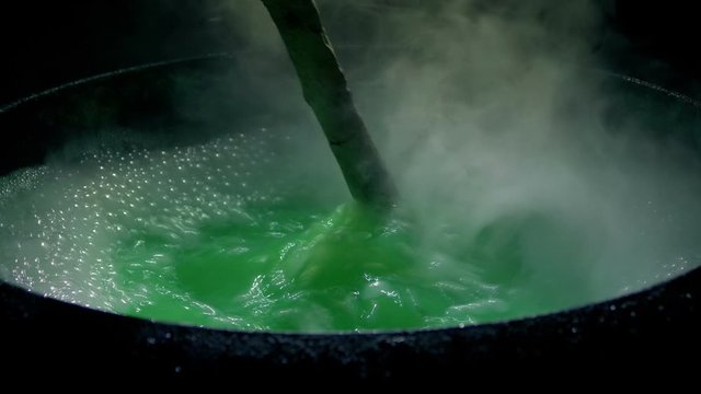 Witch Stirs Her Bubbling Cauldron