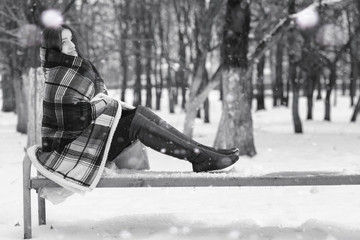A girl in a winter cloudy day