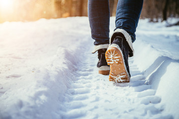 Girl is walking on snow, wintertime, cut out