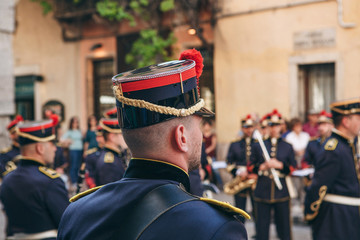 Italy, Verona, May 31, 2019: Military musician in traditional uniform at a street performance.