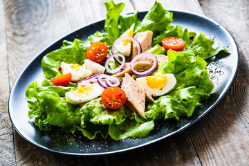 Tuna salad on wooden table