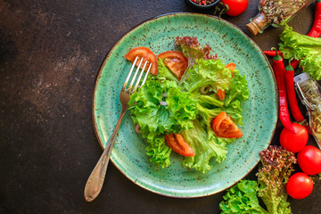 Healthy salad, leaves mix salad (mix micro greens, cucumber, tomato, chili pepper, other...
